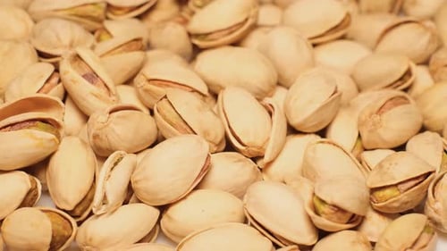 Salted Pistachios for Beer Rotating in a Circle Healthy Tasty Pistachios Salted Roasted Pistachios