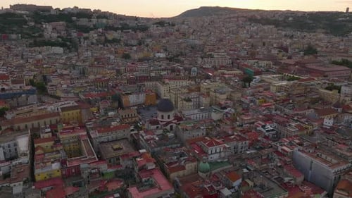 Forwards Fly Above Historic Centre of Famous City at Dusk