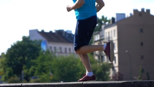 Young, Sporty Man Jogging in the City, Super