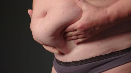 De perto de uma mulher gorda