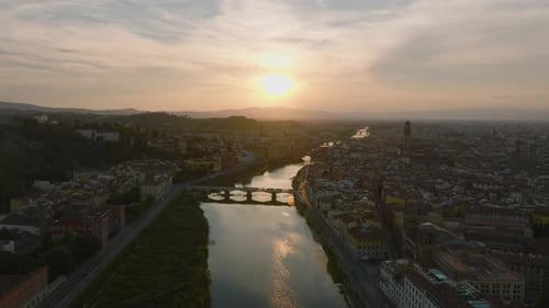 Breath Taking Aerial Footage of Bridges Over Arno River Against Romantic Colourful Sunset