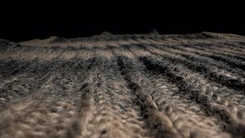 Close Up View of Knitted Wool Fabric With Brown and Gray Stripes
