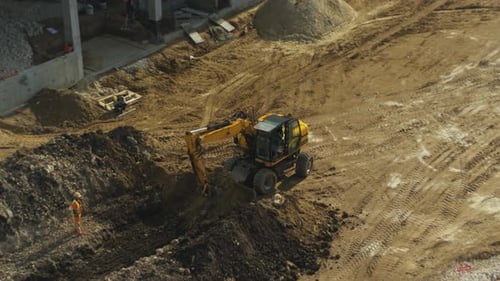 Excavator Digging at Construction Site