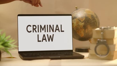 CRIMINAL LAW DISPLAYED IN LEGAL LAPTOP SCREEN