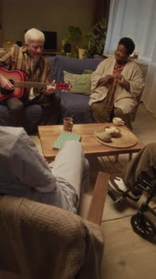 Diverse Seniors Singing Together in Nursing Home