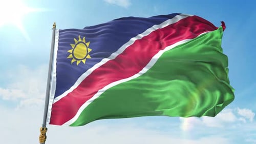 Realistic Waving Flag of Namibia with Blue Sky Background