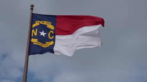 North Carolina State Flag Waving Proudly in Wind