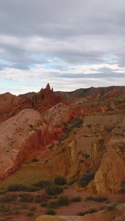 Flying Forward and Up Over Red Sandy Canyon Reveal Shot Martian Landscape Vertical Video