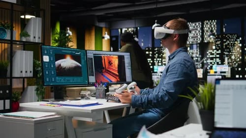Professional Male Developer Operating VR Glasses to Create Spaceship Station