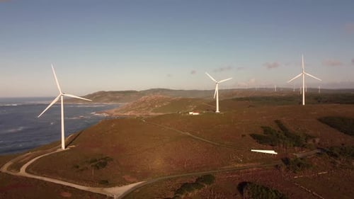 Aerial view wind turbine ocean cliff view of windmill plant farm