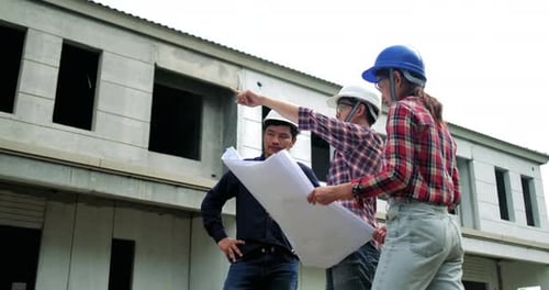 Group of young asian of building architect construction engineer have meeting