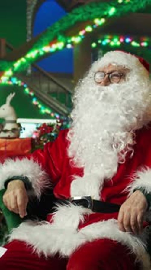 Vertical Video Santa Claus Using Augmented Reality Hologram to Read Letters Received From Kids