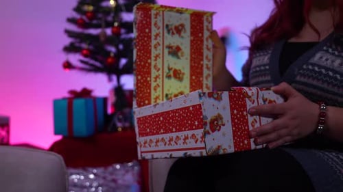 Christmas Presents being Opened at Home during Holiday