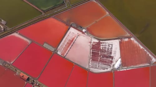 Aerial view of colorful salt pans with geometric patterns, Burgas, Bulgaria.