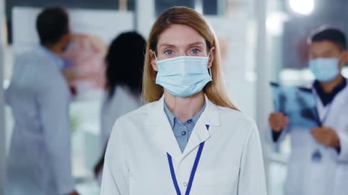 Medical Professional Wearing Mask in Hospital Setting