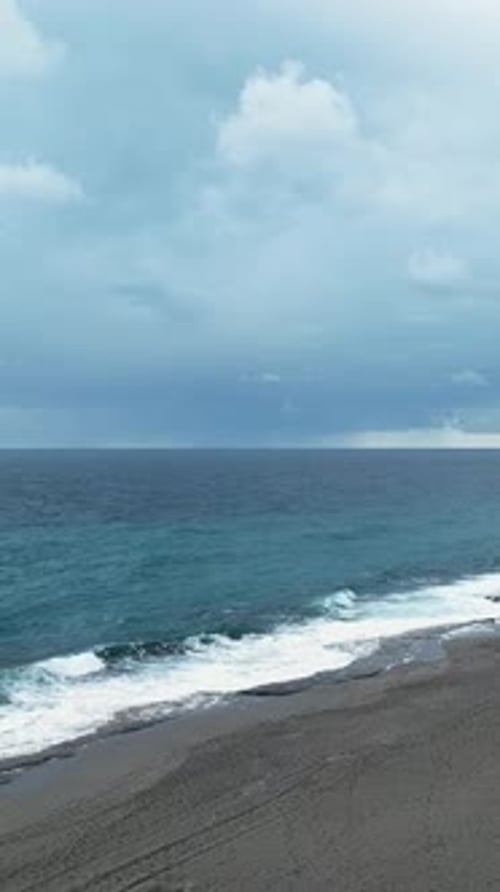 Vertical Video Majestic Cloudscape Aerial View of the Most Beautiful Coastal Sunset