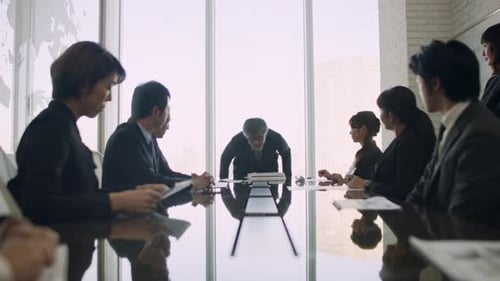 Business Team Celebrates Good News in Office