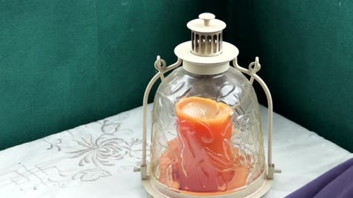 Shot of lighted candles used for prayers in memorial wedding funeral services in a religious church