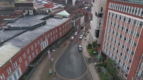 Norwich city aerial view featuring turrets, shops, modern and historic architecture