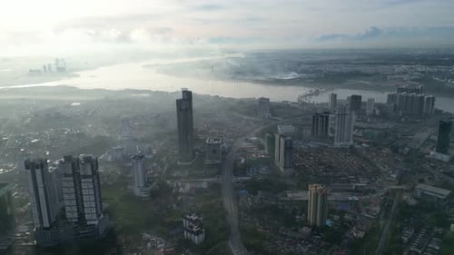 A city with a river in the background. Aerial view Johor Bahru, Johor