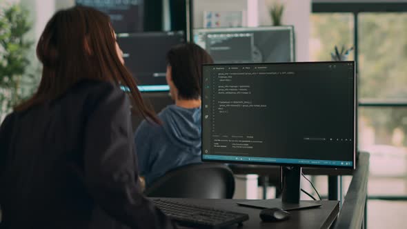 Database Programer Writing Source Code on Terminal Window with Html ...