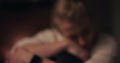 Portrait of a Sad Woman Crying at Night