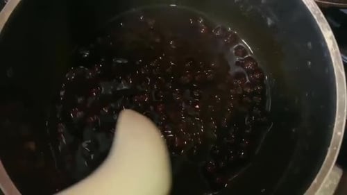 Cooking tapioca pearls also known as "boba balls" used in hot and cold beverages.