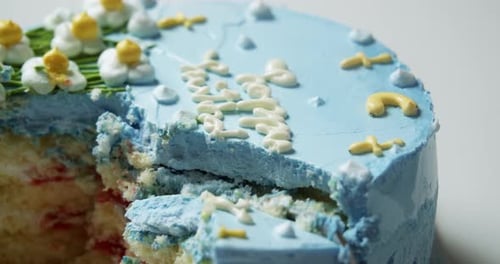 Birthday Cake Slice Being Removed with Utensil