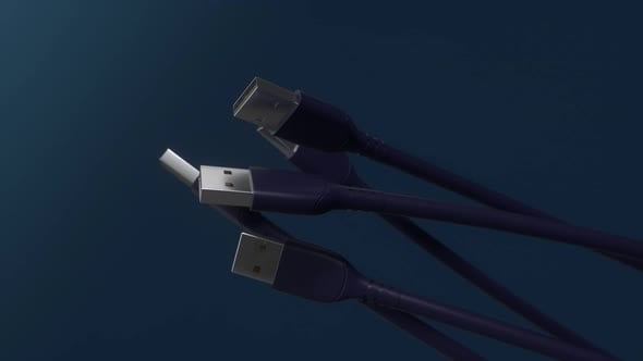USB cables spinning on blue background.Close-up view plug .USB ...