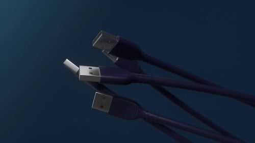 USB cables spinning on blue background.Close-up view plug .USB connectors for computer video.Loop