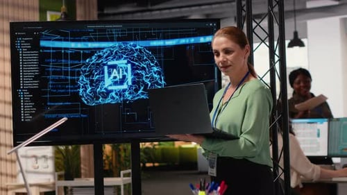 Woman Presenting AI Interface with Laptop in an Office