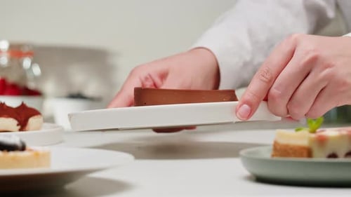 Placing Cake on Table in Bright Kitchen
