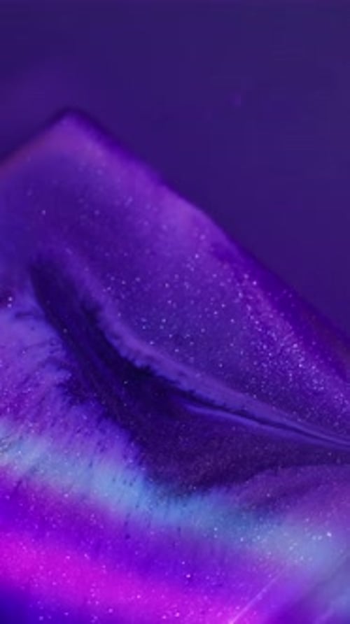 Abstract Fluid Art with Swirling Purple and Blue