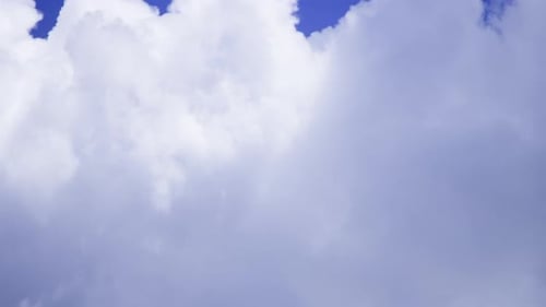 TIME-LAPSE OF CUMULUS NIMBUS CLOUDS FORMING AT NOON