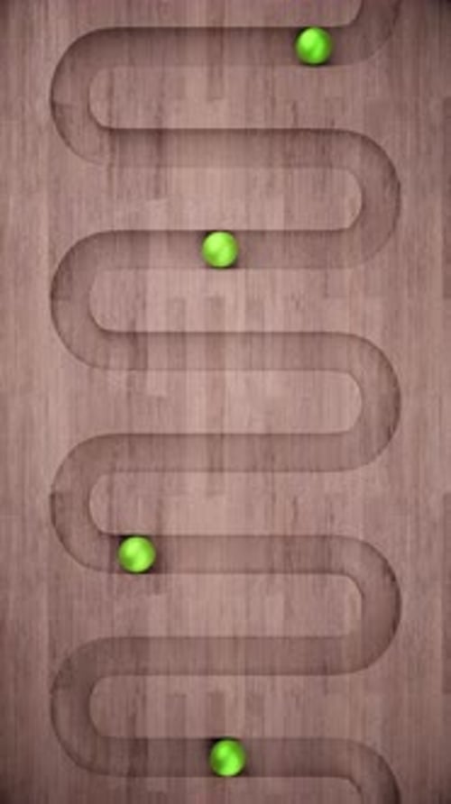 Marbles Rolling Down Curved Wooden Path Animation