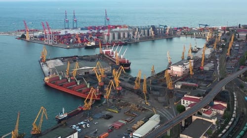 Aerial View of Sea Port with Ships and Containers