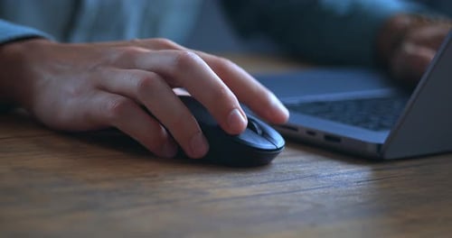 Close Up of Businessman is Hold White Computer Mouse in Hand and Click