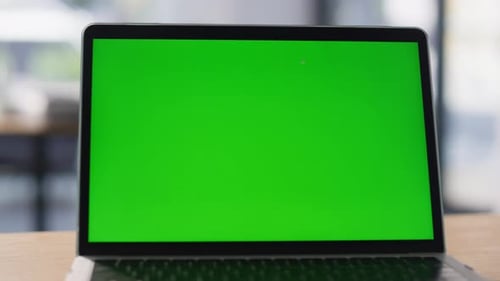 Modern Green Screen Laptop Displayed on Work Desk Closeup Chroma Key Computer