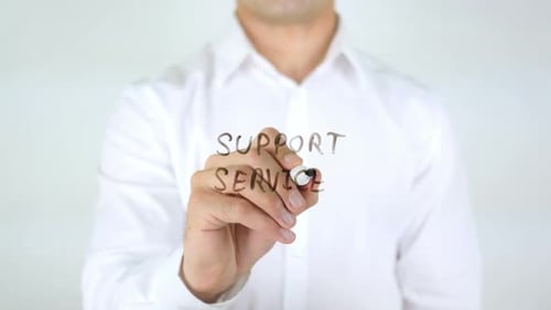 Services de soutien, Homme écrivant sur du verre