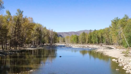 Poetic landscapes, clean blue skies, clear rivers, and lush trees, canyon.