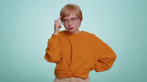 Woman Has an Idea and Points Upward