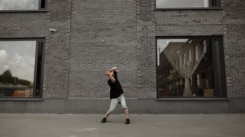 Young Adult Dancing in an Urban Setting