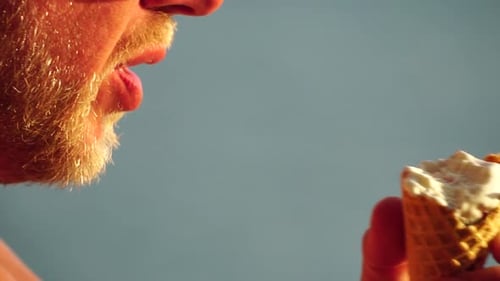 Adult Eating Ice Cream Cone Close Up