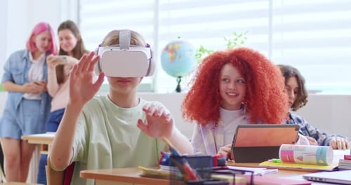 Students Using VR Headset and Tablets in Classroom