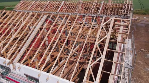 Aerial View of New Home Under Construction With Truss Roof