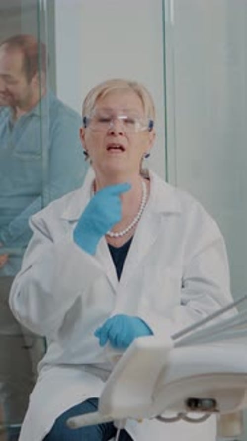 Woman Doctor Explaining in a Dental Office