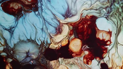 Abstract Fluid Colors Mixing and Swirling Close-Up