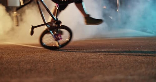 BMX Barspin Bike Trick in Urban Night Scene