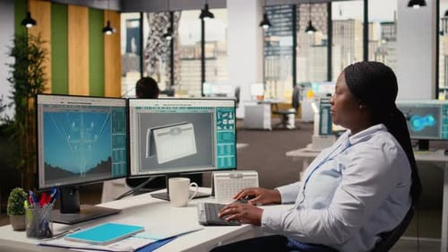 Happy Product Developer in Office Using Advanced Solar Cell Technology