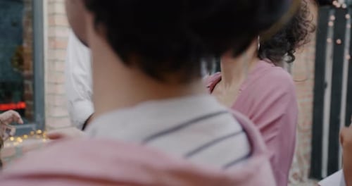 Friends Dancing Together at an Outdoor Party